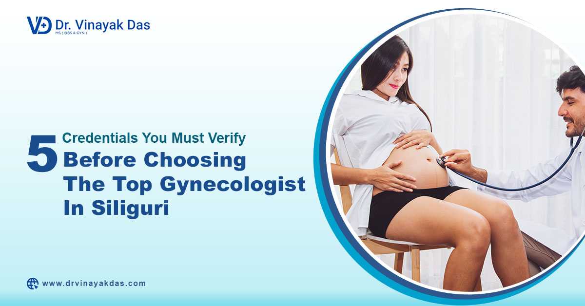 Pregnant woman consulting a gynecologist during a prenatal checkup, representing key credentials to verify before choosing the top gynecologist in Siliguri.